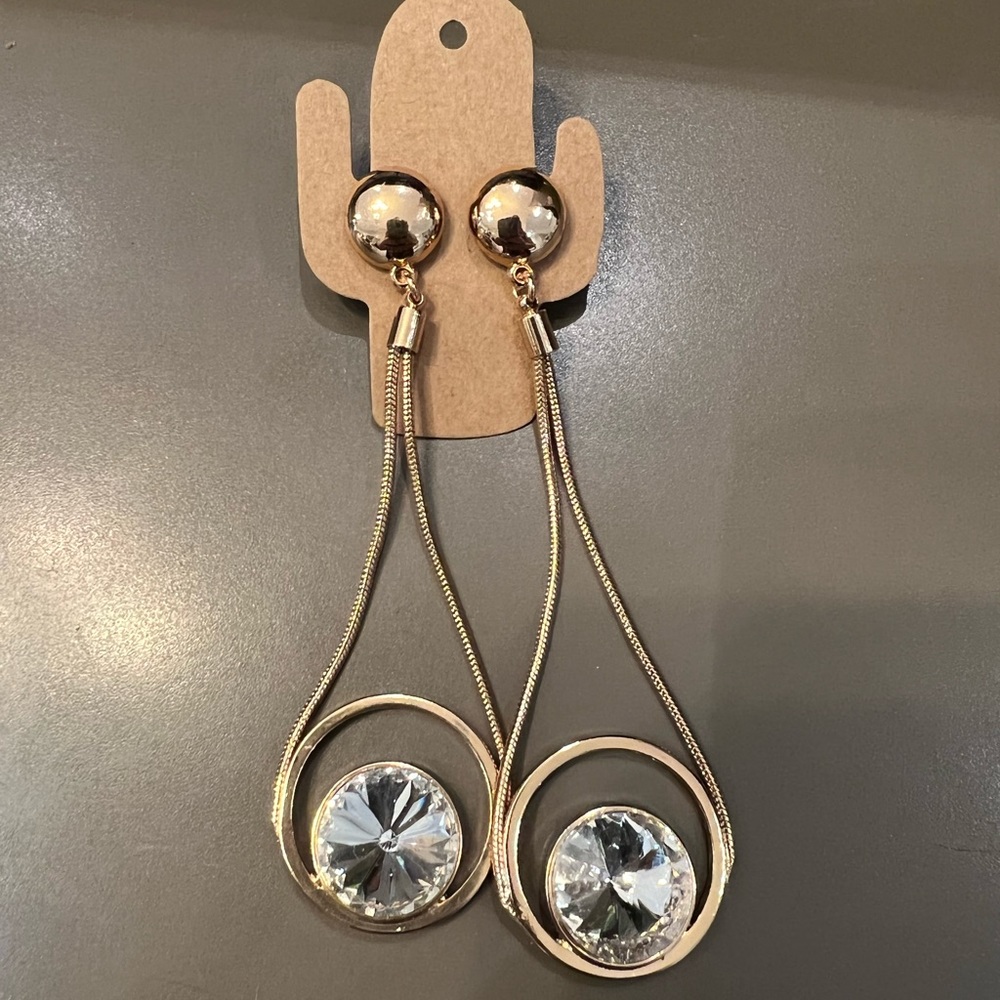 Earrings Gold-tone Dangle New. Clear rhinestone.